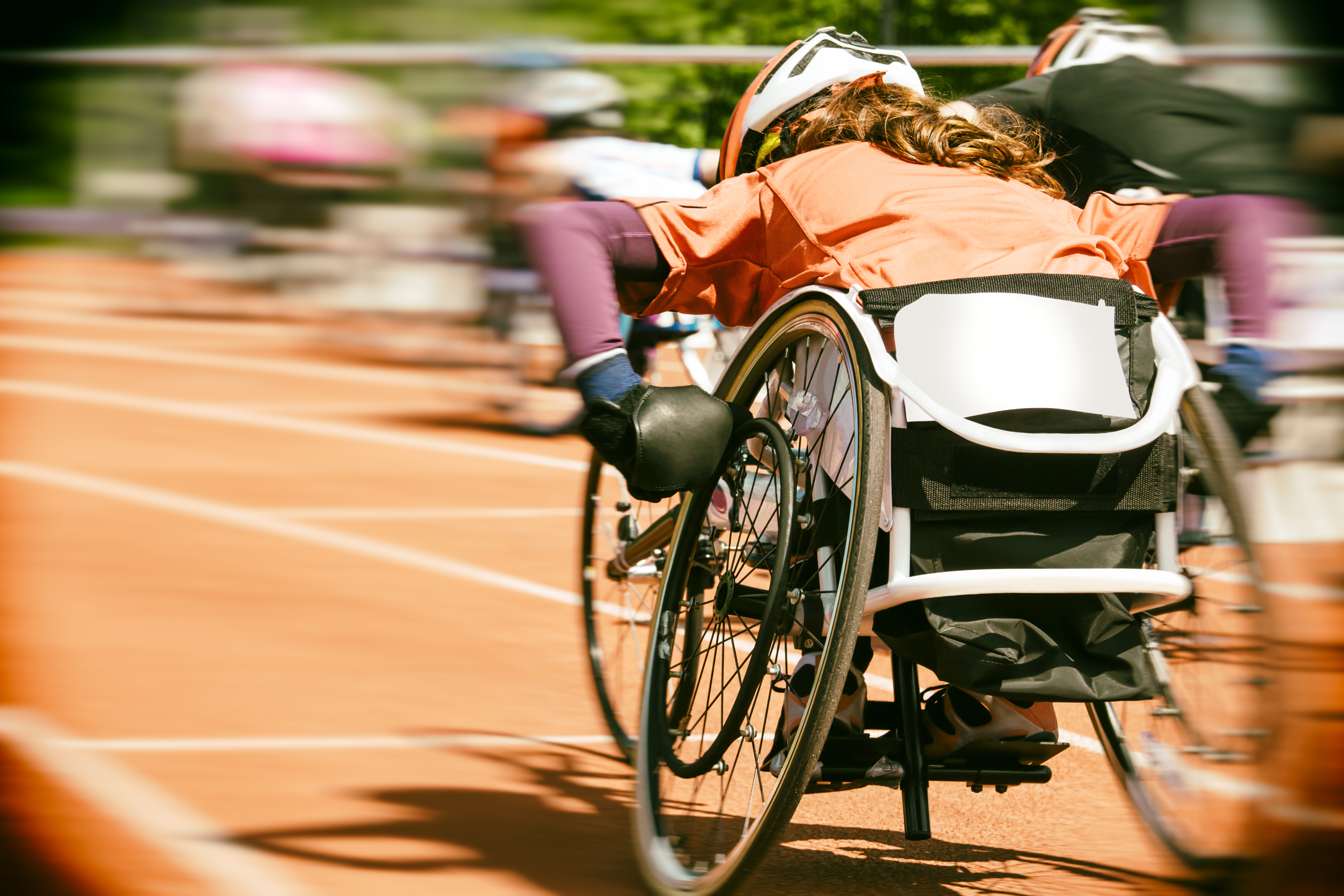 Wheelchair user racing in an event