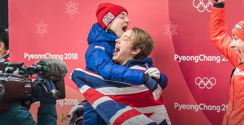Olympic skeleton medallist Laura Deas hugging teammate Lizzy Yarnold